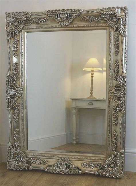 large oversized rectangular ornate mirror.